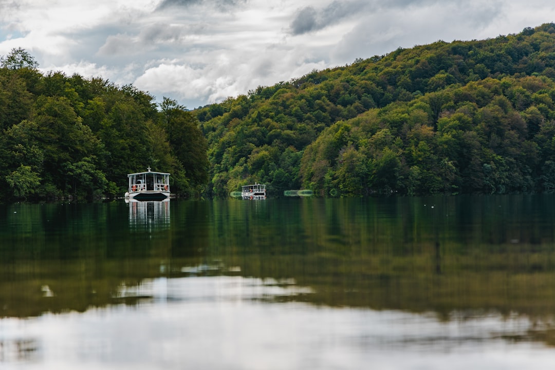 Electric boat crossing Kozjak lake as part of Plitvice hiking routes